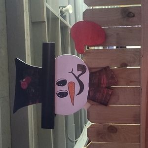 Snowman fence peepers